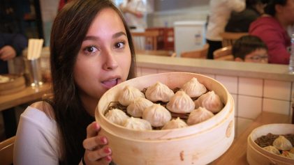J Lou holding Xiao Long Bao | Shanghai Snacks Part 1 | The China Travel Video | ANYDOKO